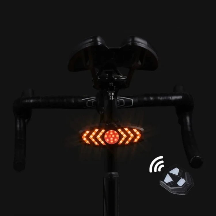 LAMPKA-ROWEROWA-KIERUNKOWSKAZY-ROWEROWE-LED-MIGACZE-LAMPA-SWIATLO-TYL-PILOT-Waga-50-g.jpg